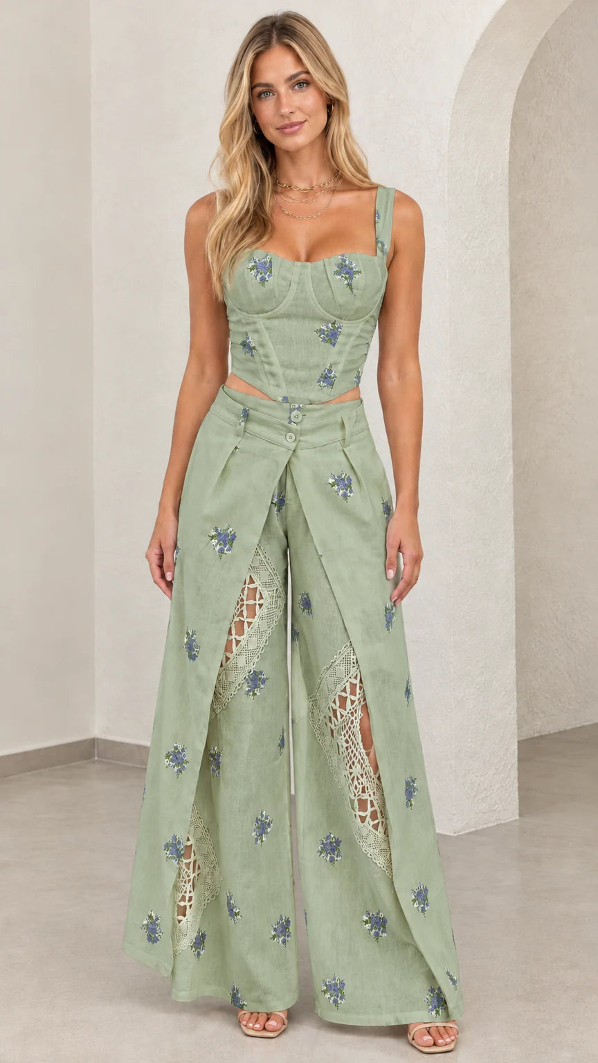 Model wearing sage green floral embroidered two piece corset pant set