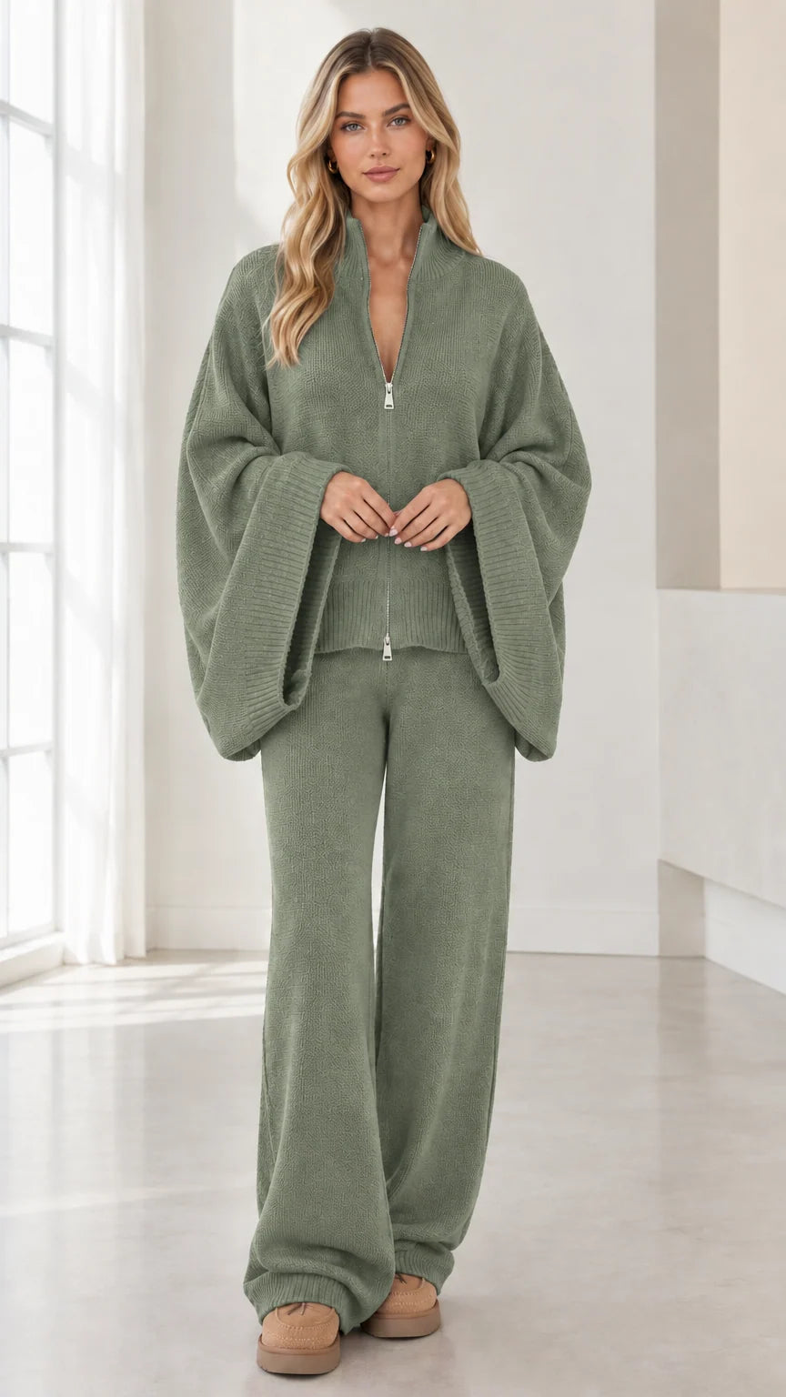 Front view of woman wearing Sage Green knit zip-up lounge set with wide bell sleeves