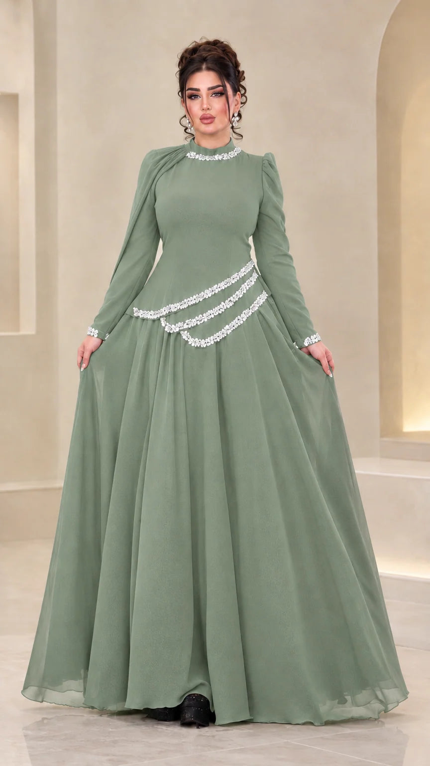 Front view of model wearing sage green rhinestone chiffon evening gown