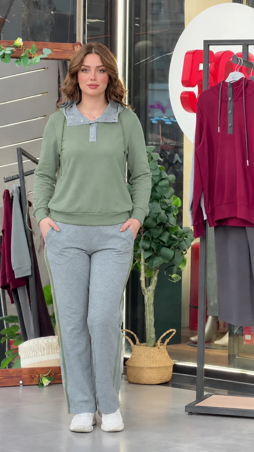 Model wearing sage green long sleeve top with contrast grey collar and matching grey sweatpants