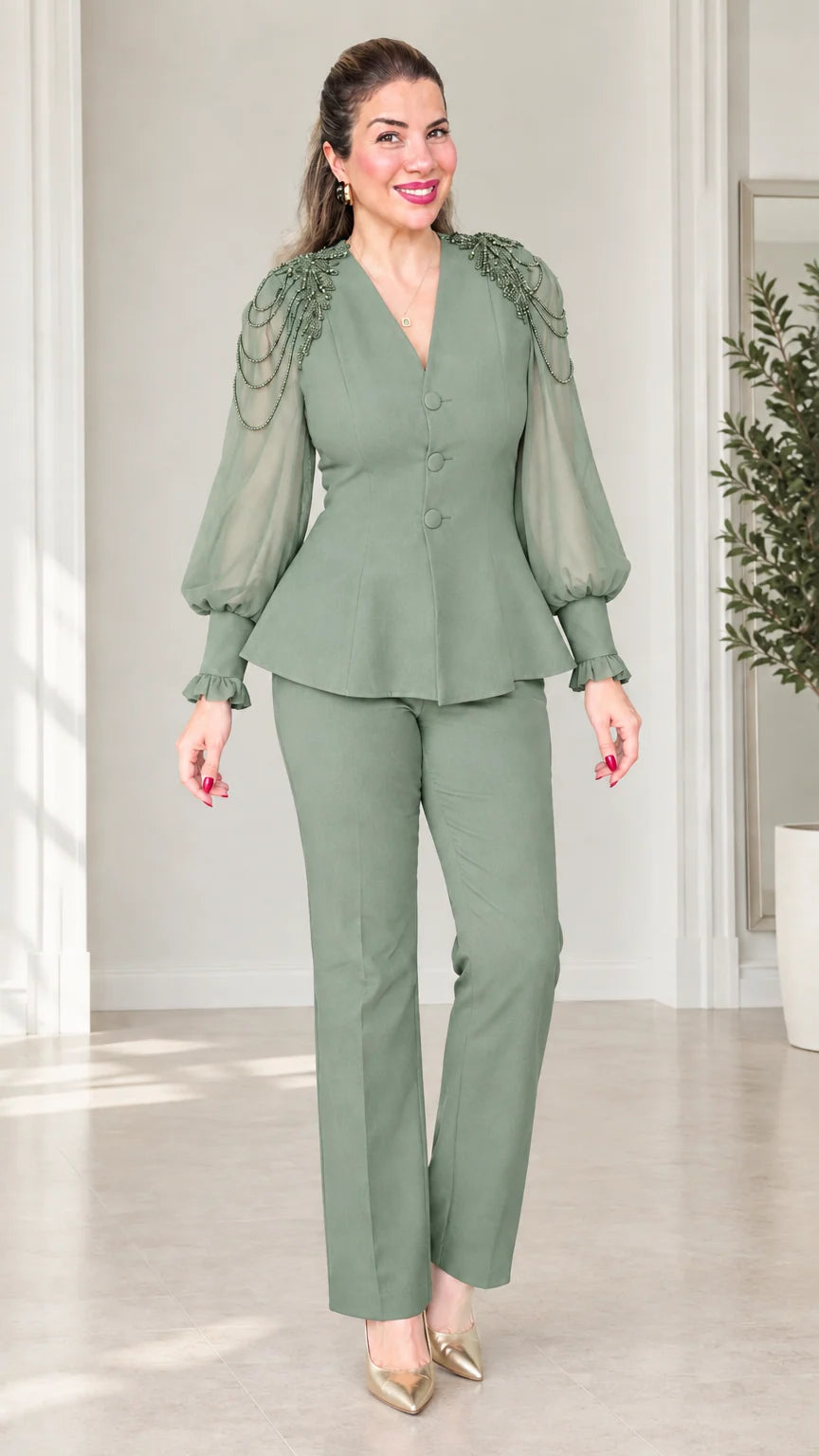 Front view of woman wearing sage green beaded peplum top and trousers set