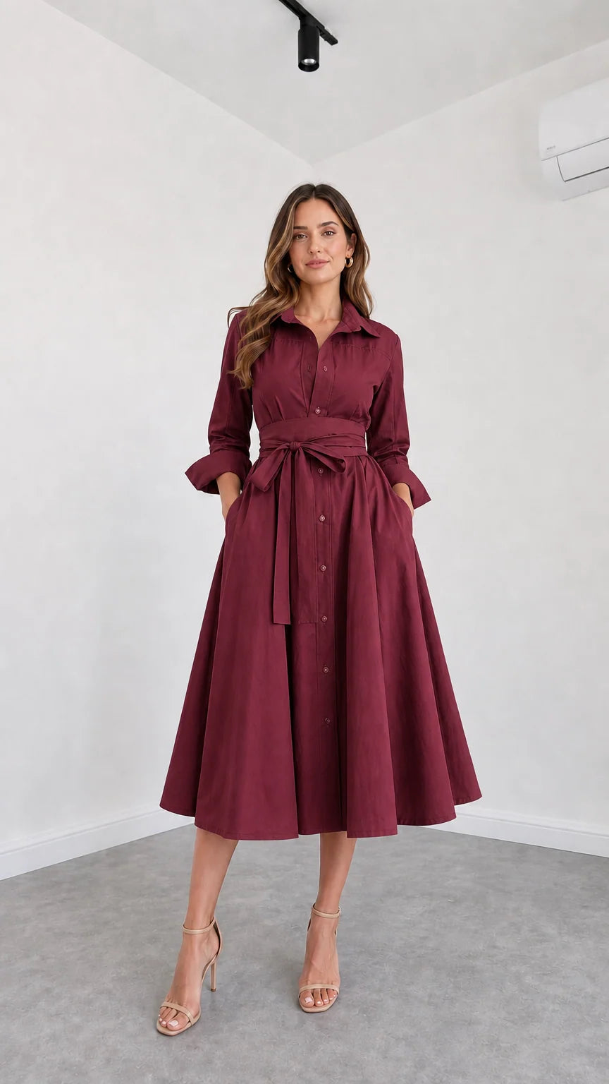 Front view of model wearing Burgundy button-down belted midi shirt dress