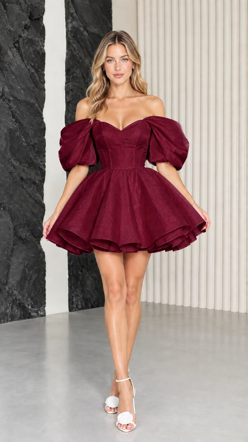 Model wearing burgundy off-the-shoulder corset puff sleeve mini dress