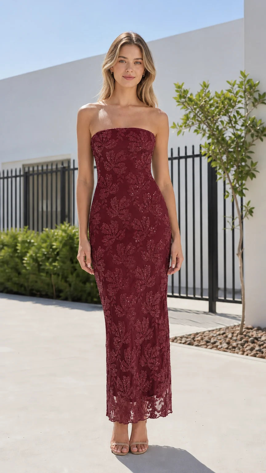 Front view of model wearing burgundy strapless sequin lace maxi dress