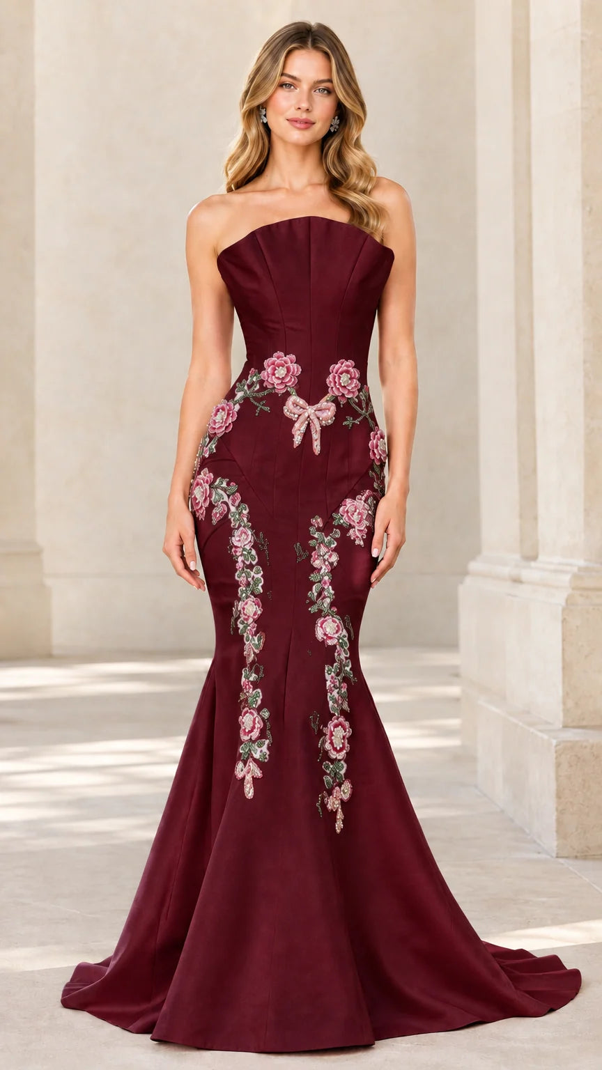 Front view of burgundy strapless floral embroidered mermaid evening dress