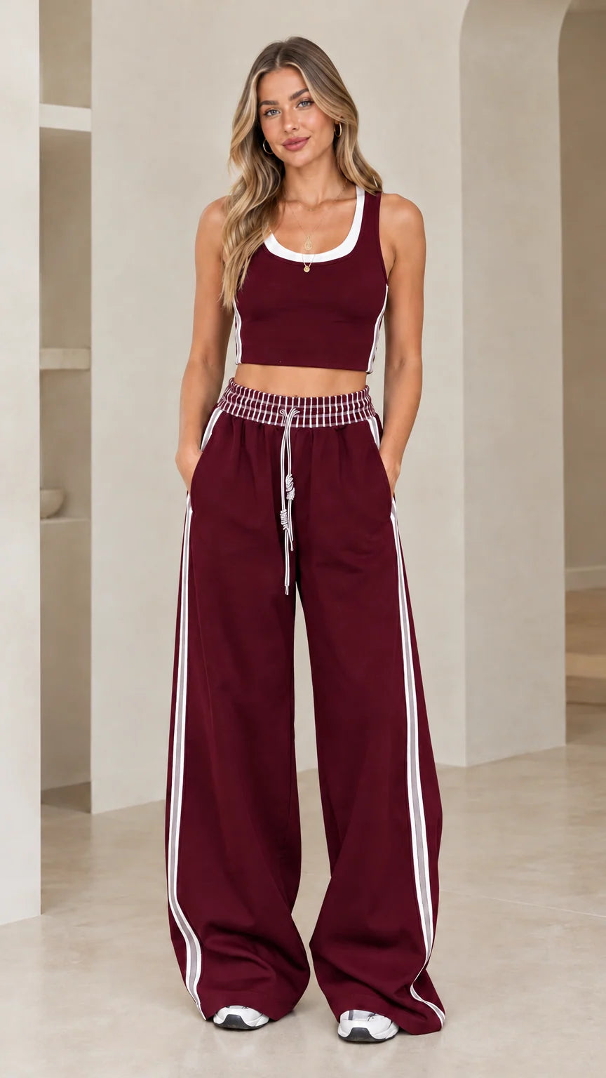 Front view of model wearing Burgundy crop tank and wide-leg pants set