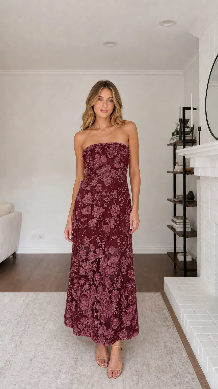 Full view of model wearing burgundy floral applique maxi dress