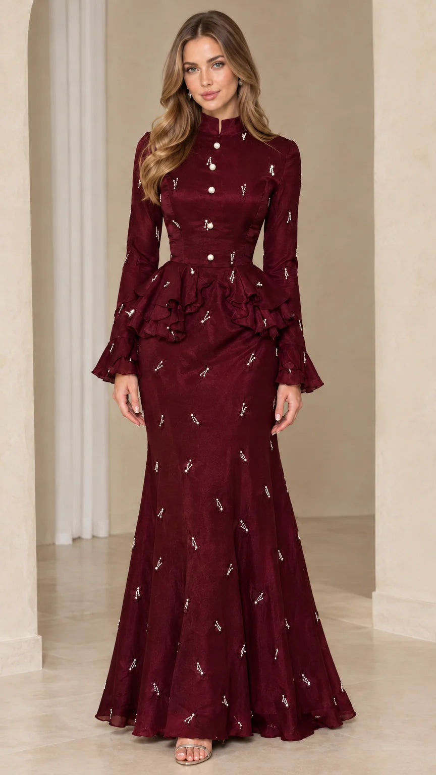 Full-length view of burgundy red embellished peplum mermaid maxi dress