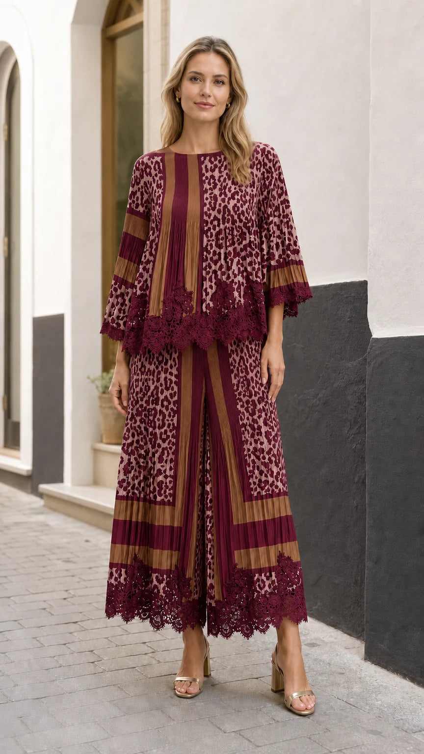 Full front view of model wearing the burgundy red pleated leopard two-piece set