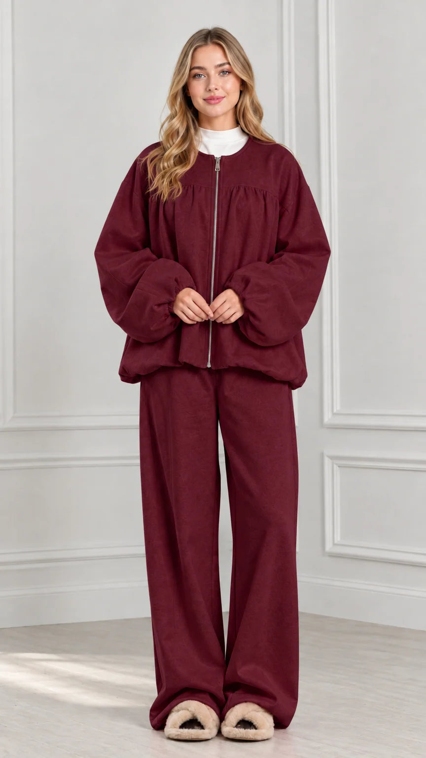 Full-body view of burgundy wine red two-piece zip jacket and wide-leg lounge set