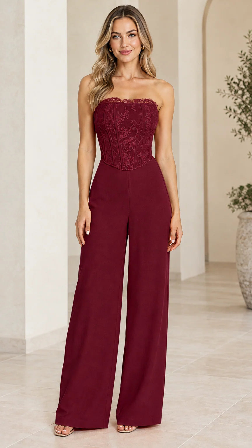Front view of model wearing burgundy strapless lace corset wide leg jumpsuit