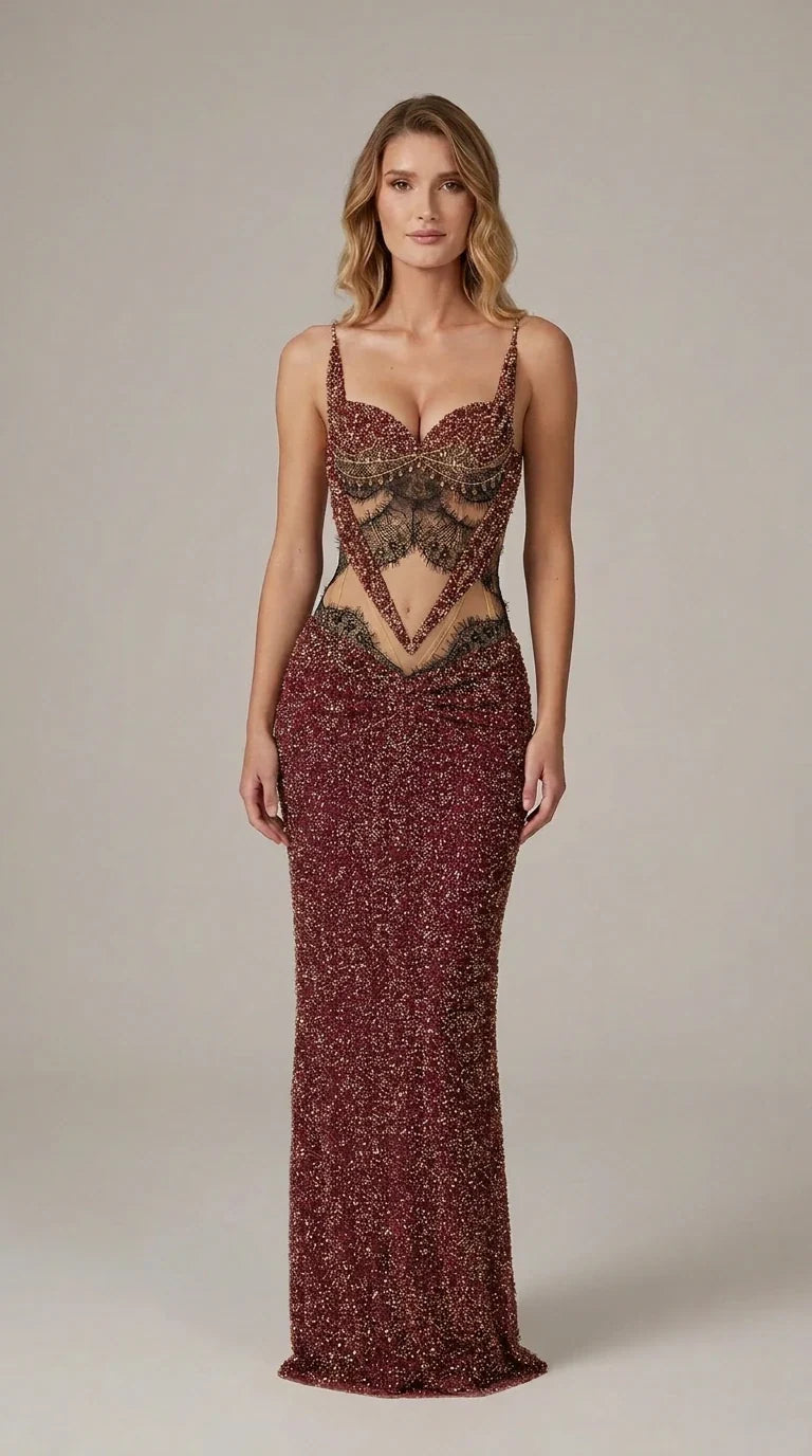 Model wearing burgundy wine red beaded floor-length dress with lace cutouts