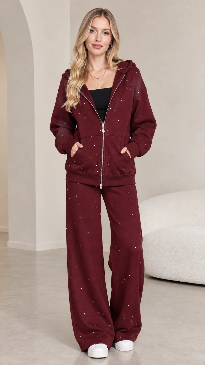 Full front view of model wearing burgundy wine red rhinestone zip hoodie and wide-leg sweatpants set