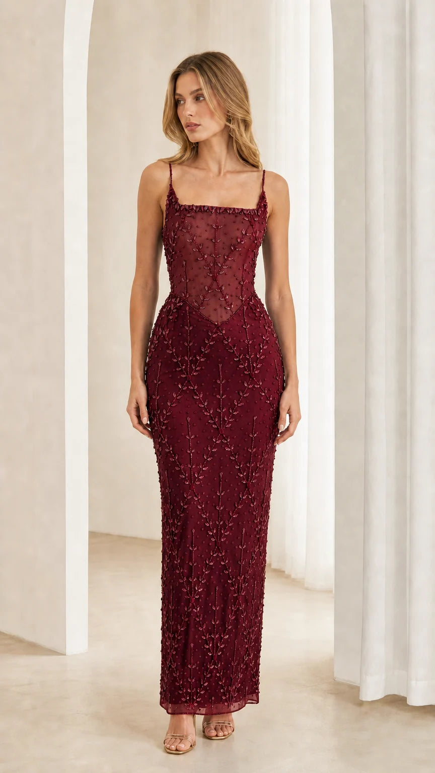 Front view of model wearing Burgundy wine beaded corset evening dress