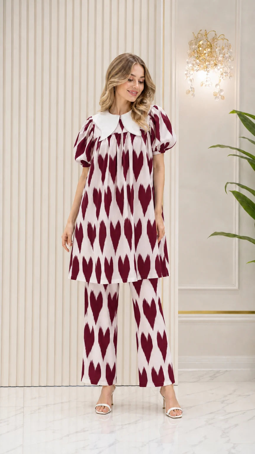 Model wearing Burgundy geometric print tunic top and trouser set