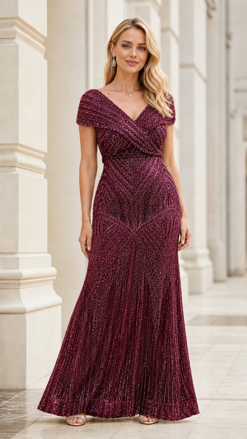 Woman wearing burgundy beaded floor-length dress