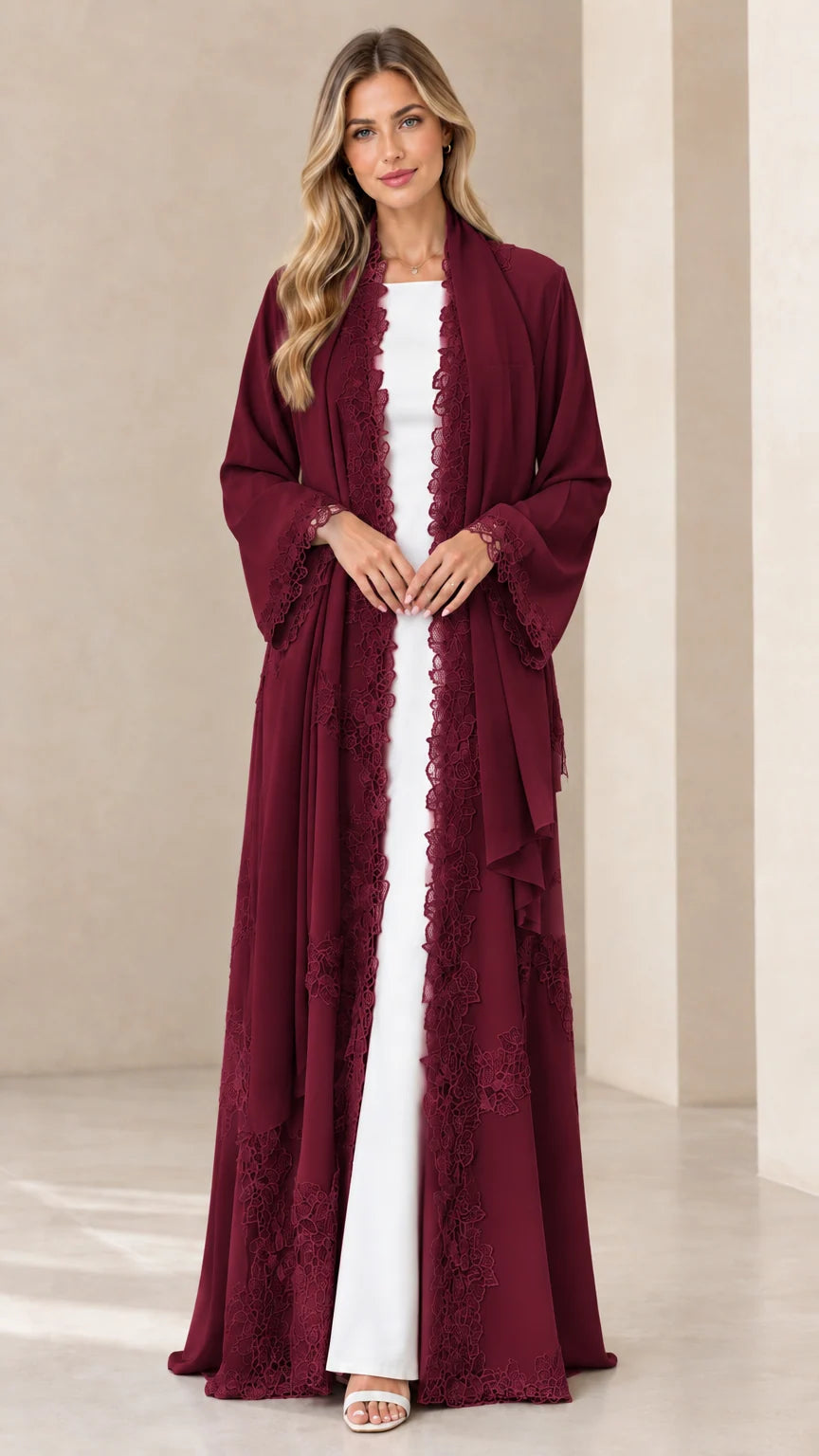 Front view of model wearing rich burgundy lace-trim maxi open front cardigan