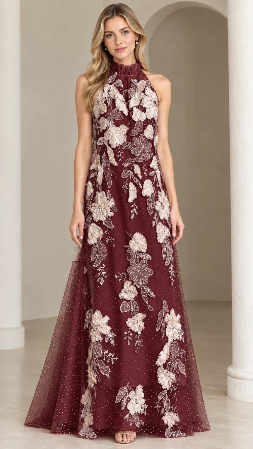 Front view of burgundy red tulle evening gown with cream floral appliques