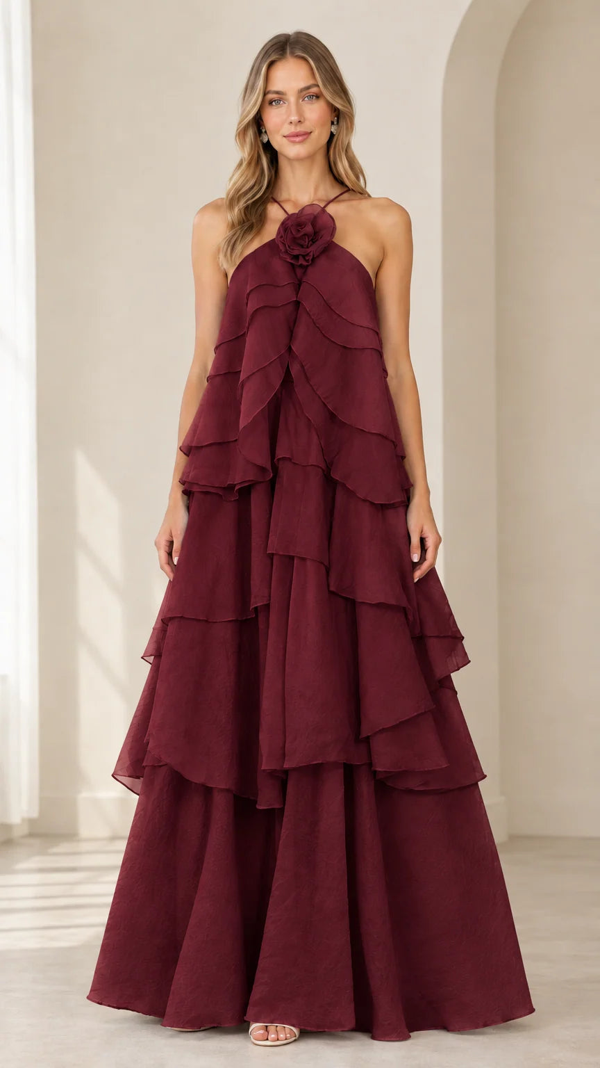 Full-length front view of model wearing Burgundy wine tiered halter evening dress