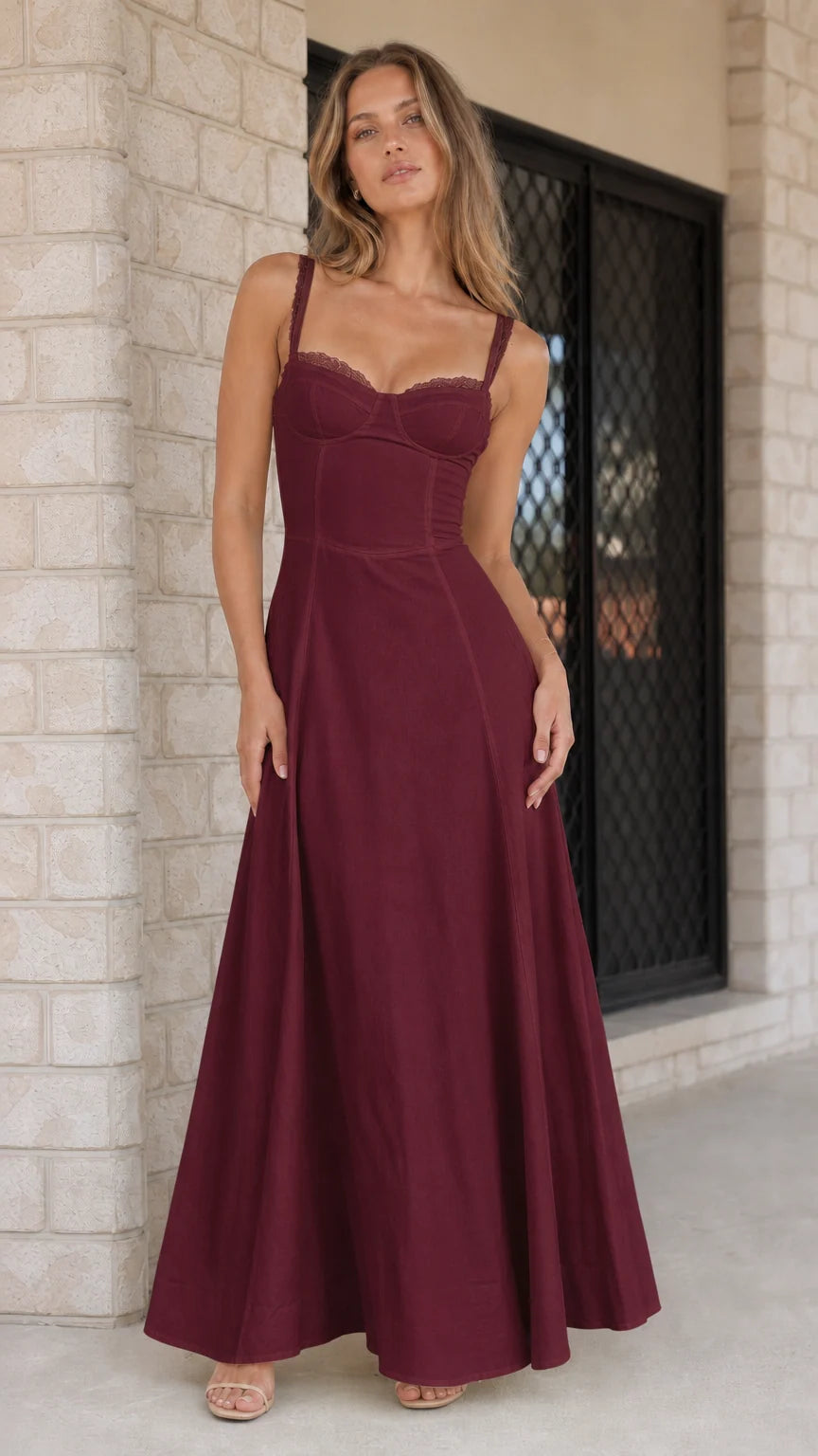 Woman wearing deep burgundy evening maxi dress