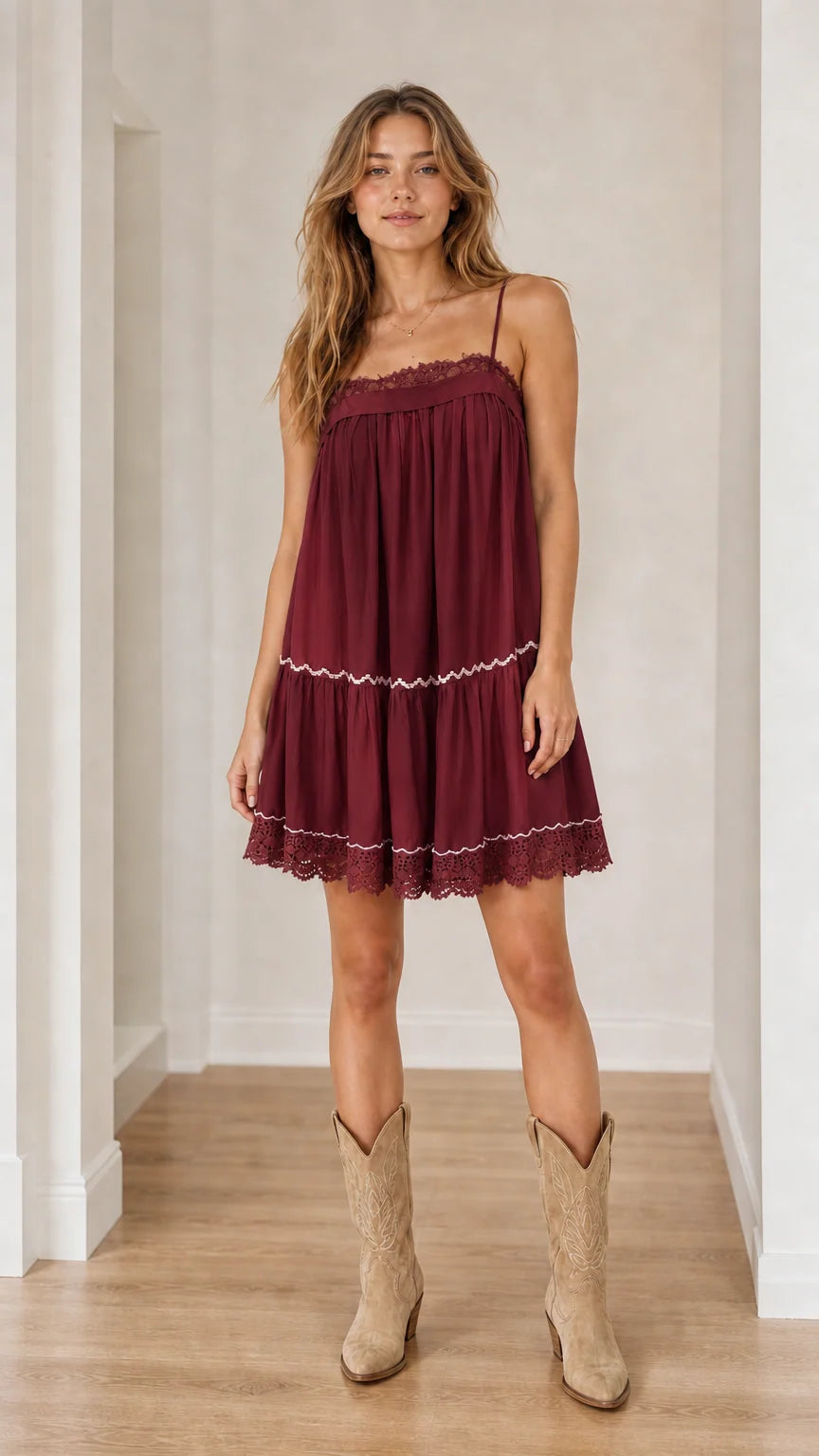 Model wearing burgundy boho mini dress