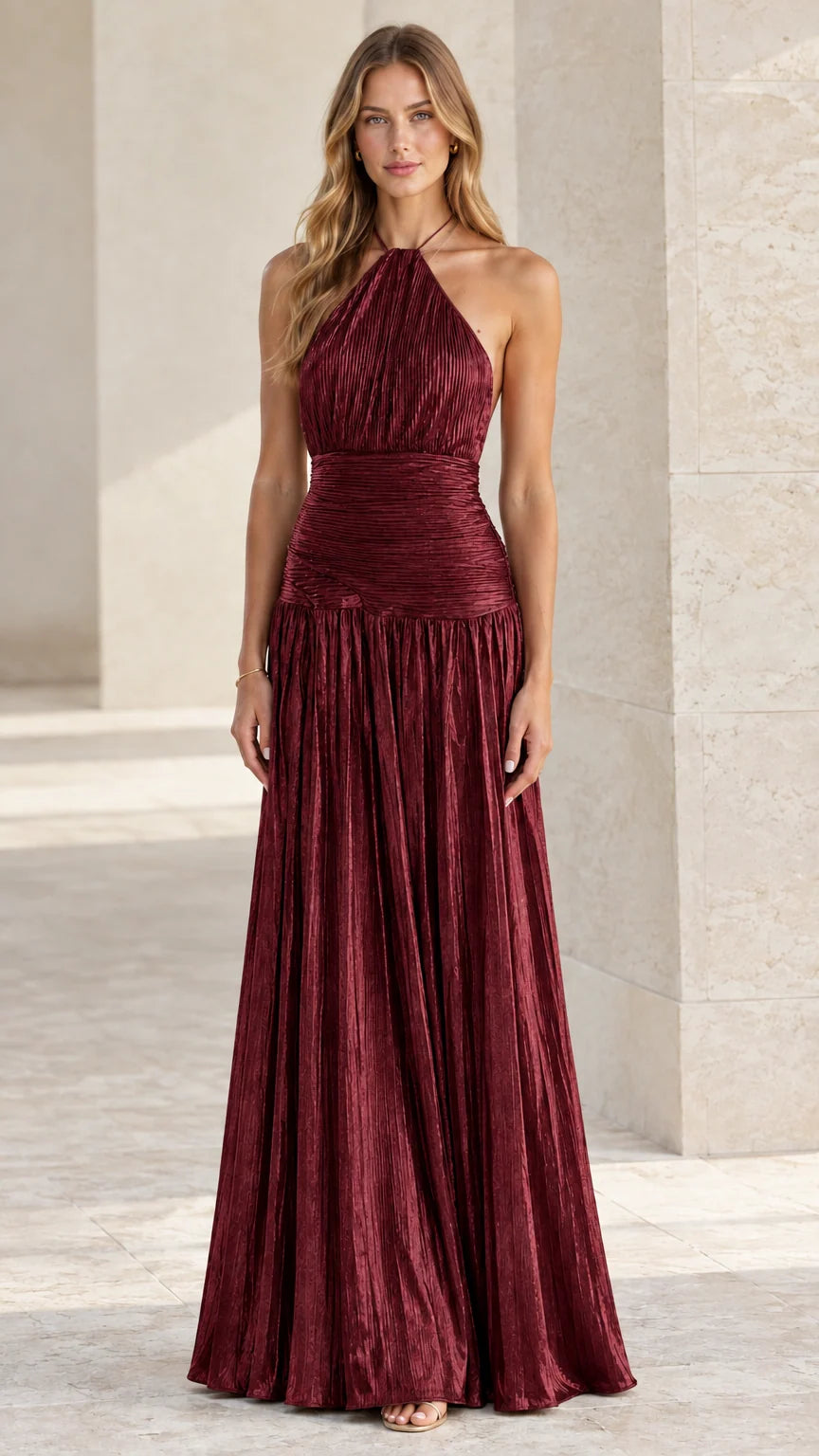 Model wearing burgundy wine red pleated drop waist maxi dress