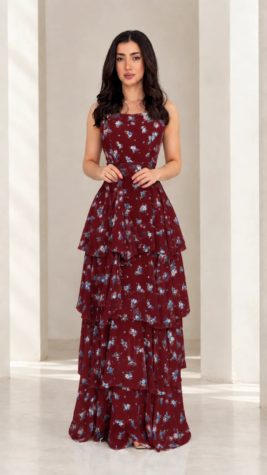 Model wearing burgundy floral tiered ruffle maxi dress