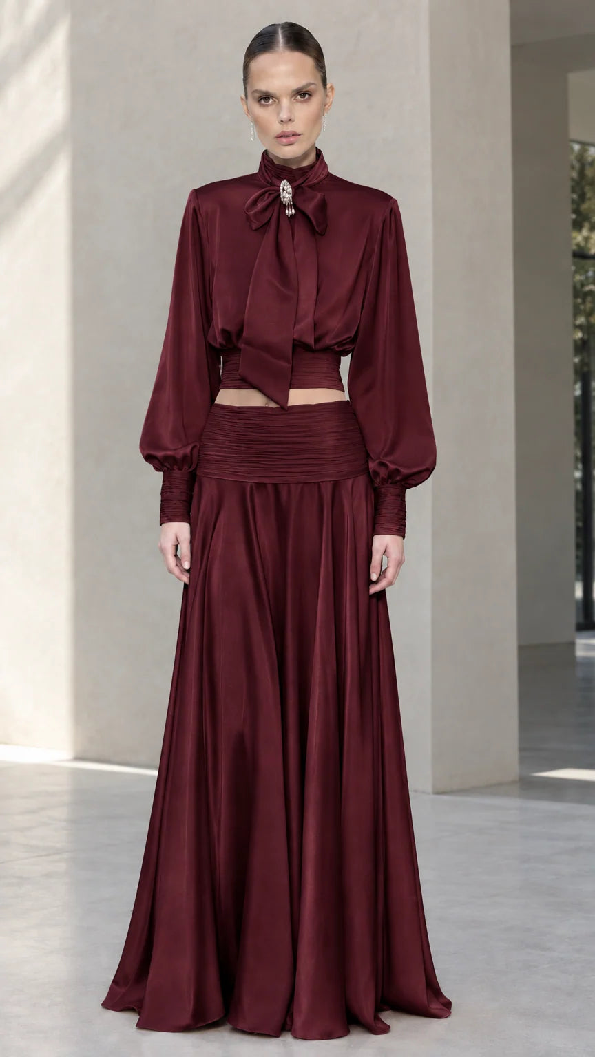 Full-length front view of burgundy wine satin bow tie blouse and maxi skirt set