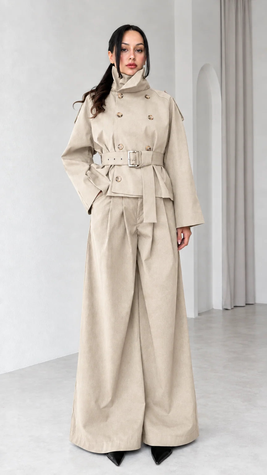 Model wearing Beige belted trench jacket and wide-leg matching pant set