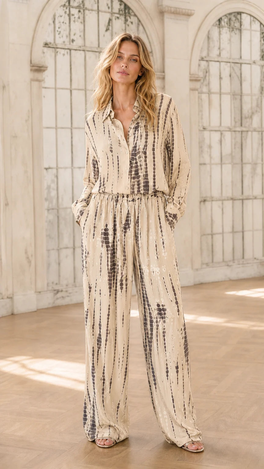 Model wearing beige tie-dye jumpsuit