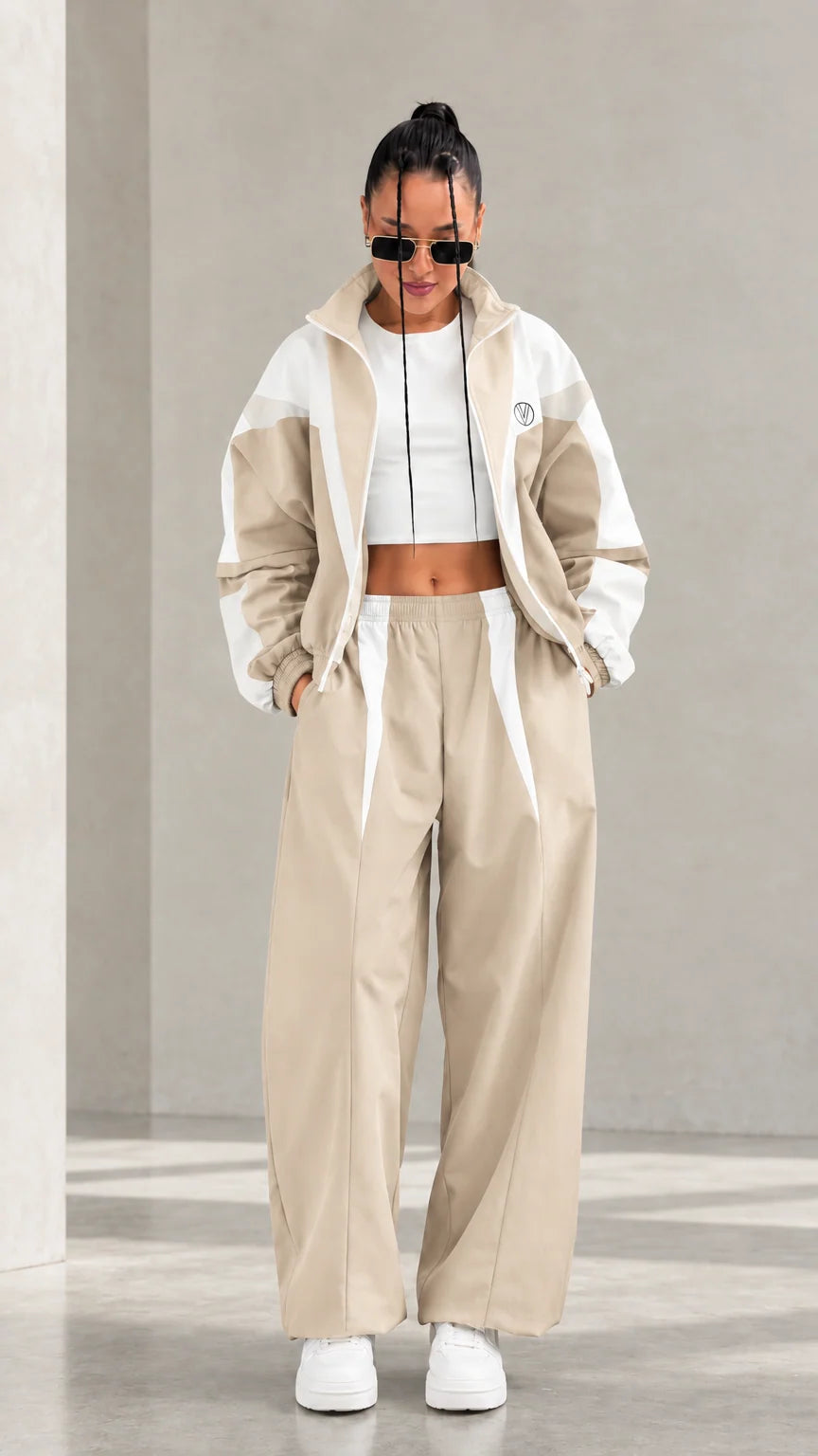 Model wearing Beige colorblock tracksuit set with white accents