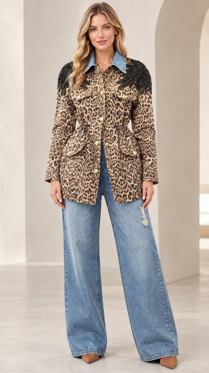 Model wearing tan leopard print utility jacket with denim collar