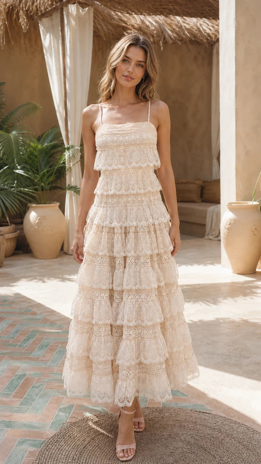 Front view of model wearing beige tiered lace maxi dress