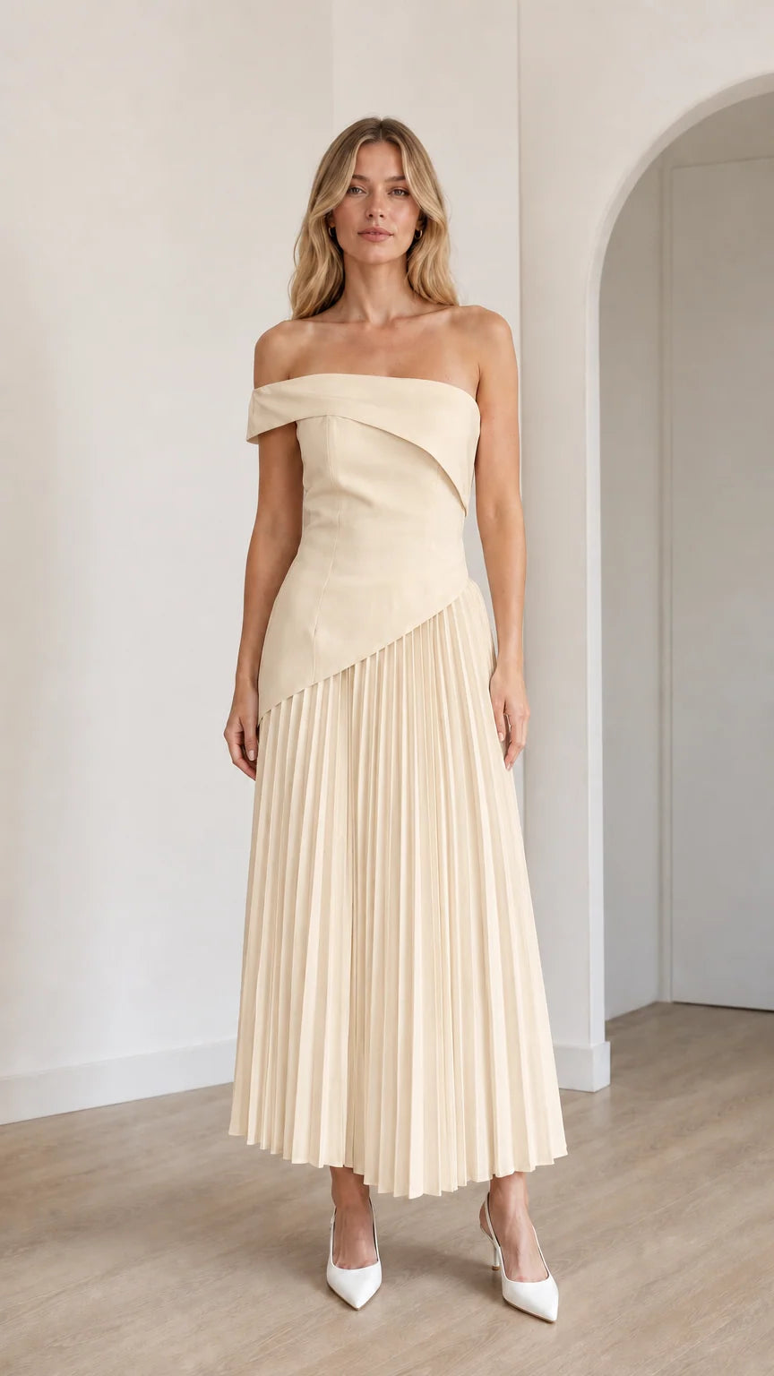 Model wearing champagne off-shoulder asymmetric pleated midi dress