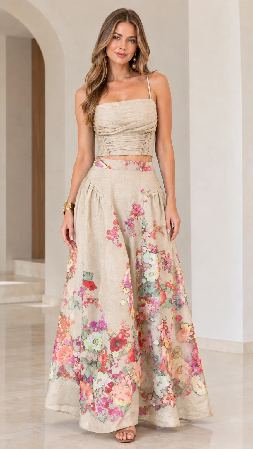 Full-length view of beige cream floral two-piece crop top and maxi skirt set