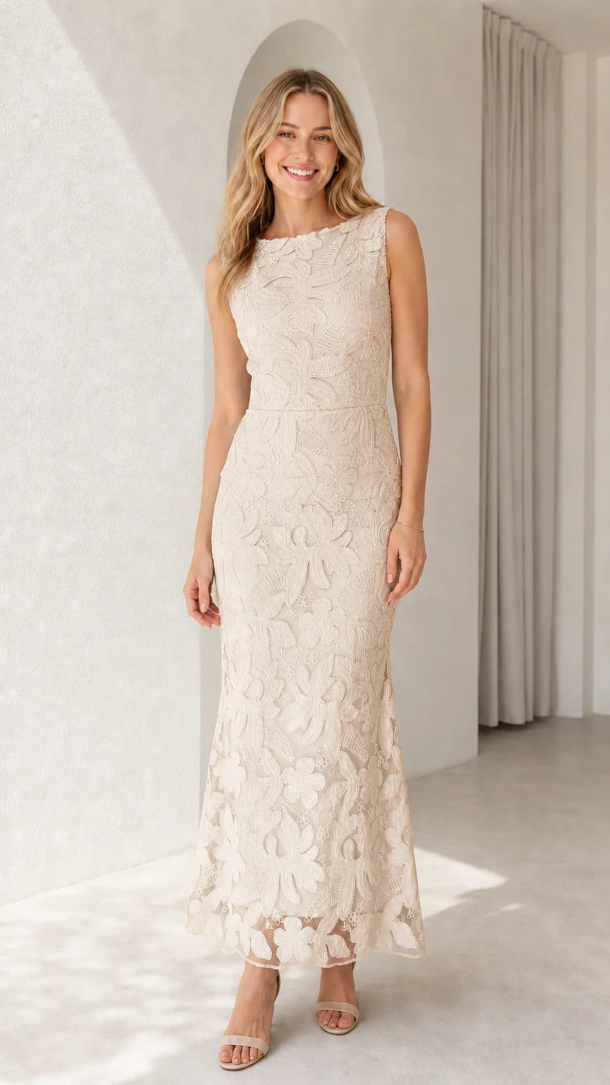 Model wearing champagne cream sleeveless floral lace maxi gown