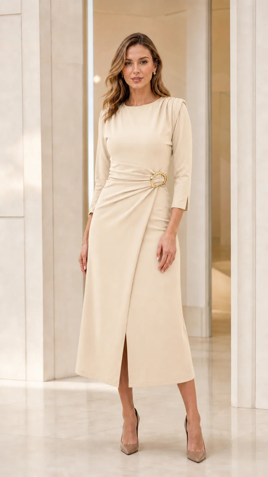 Model wearing cream off-white 3/4 sleeve gathered waist midi dress with gold buckle