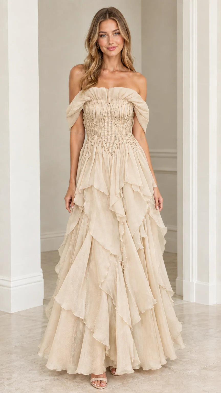 Front view of model wearing Champagne off-the-shoulder tiered ruffle maxi gown