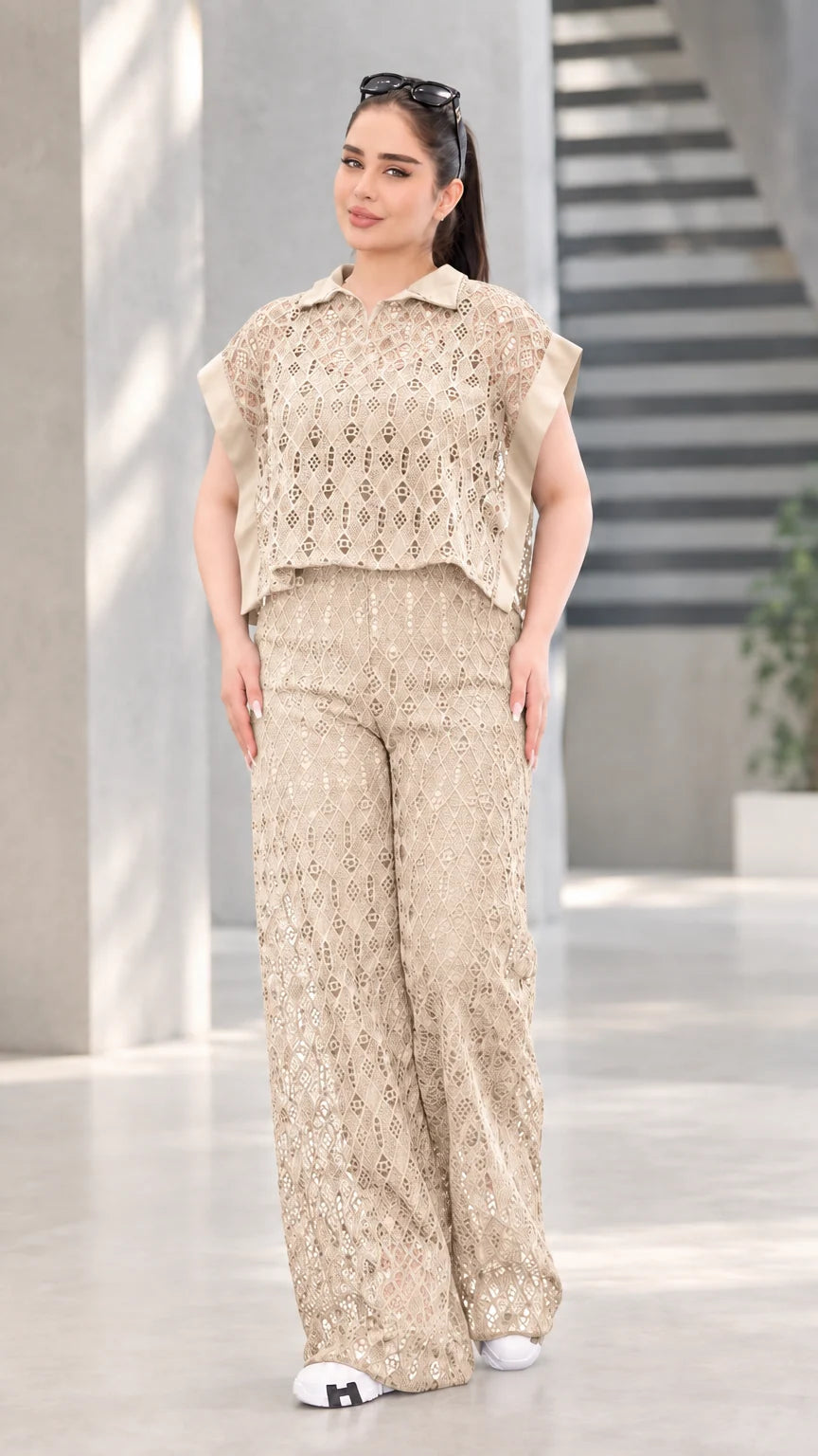 Front view of woman wearing beige khaki lace two-piece top and wide-leg pants set