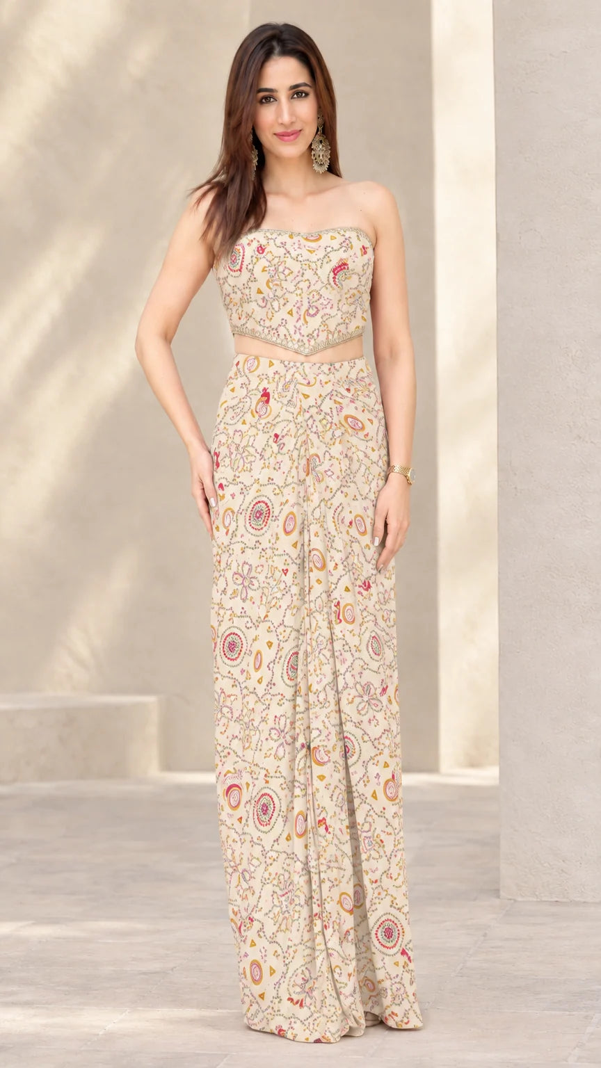 Woman wearing Cream printed strapless crop top and draped skirt co-ord set
