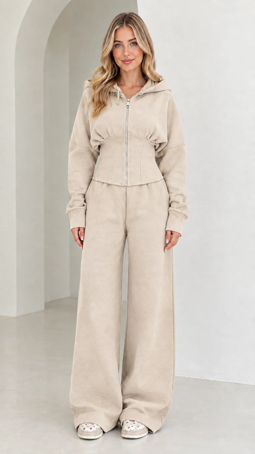 Full-length view of women's corset hoodie and wide-leg sweatpants set in Cream