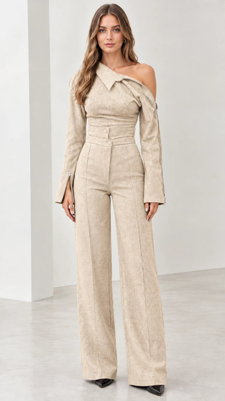 Front view of model wearing beige tailored one-shoulder wide-leg jumpsuit