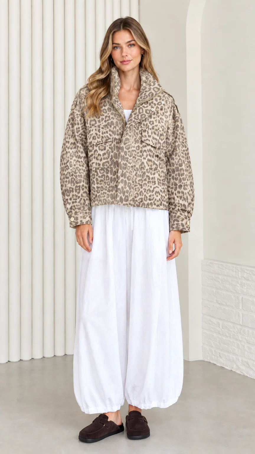 Model wearing classic beige tan leopard print cropped utility jacket