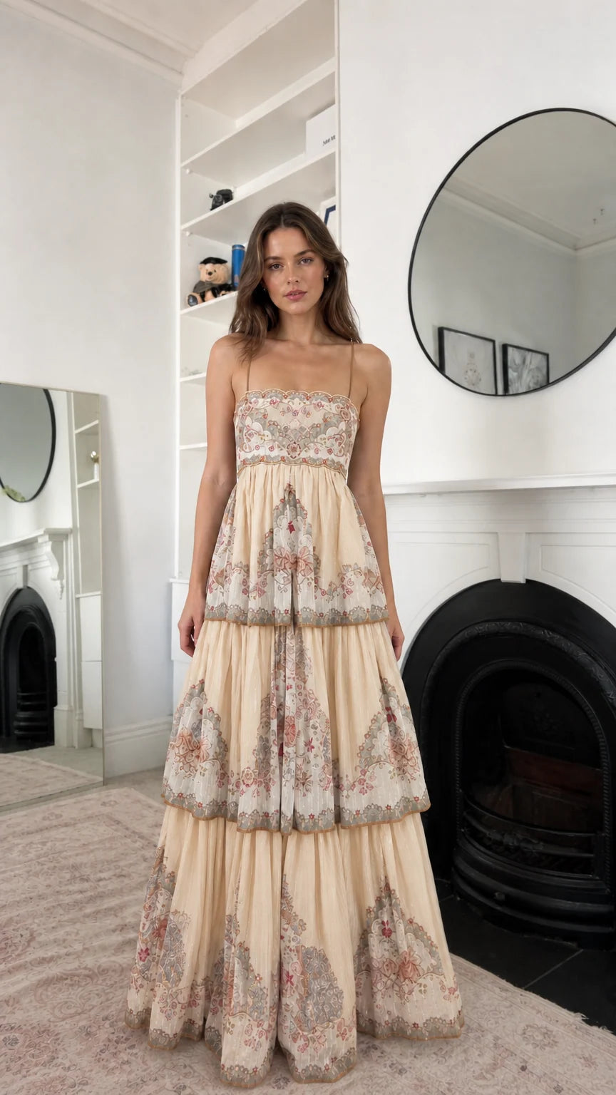 Cream floral tiered maxi dress shown from the front