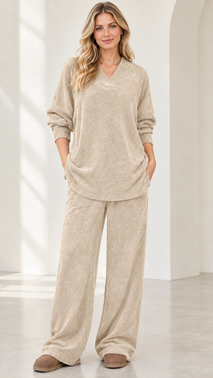 Front view of woman wearing beige oatmeal textured knit V-neck top and matching wide leg pants