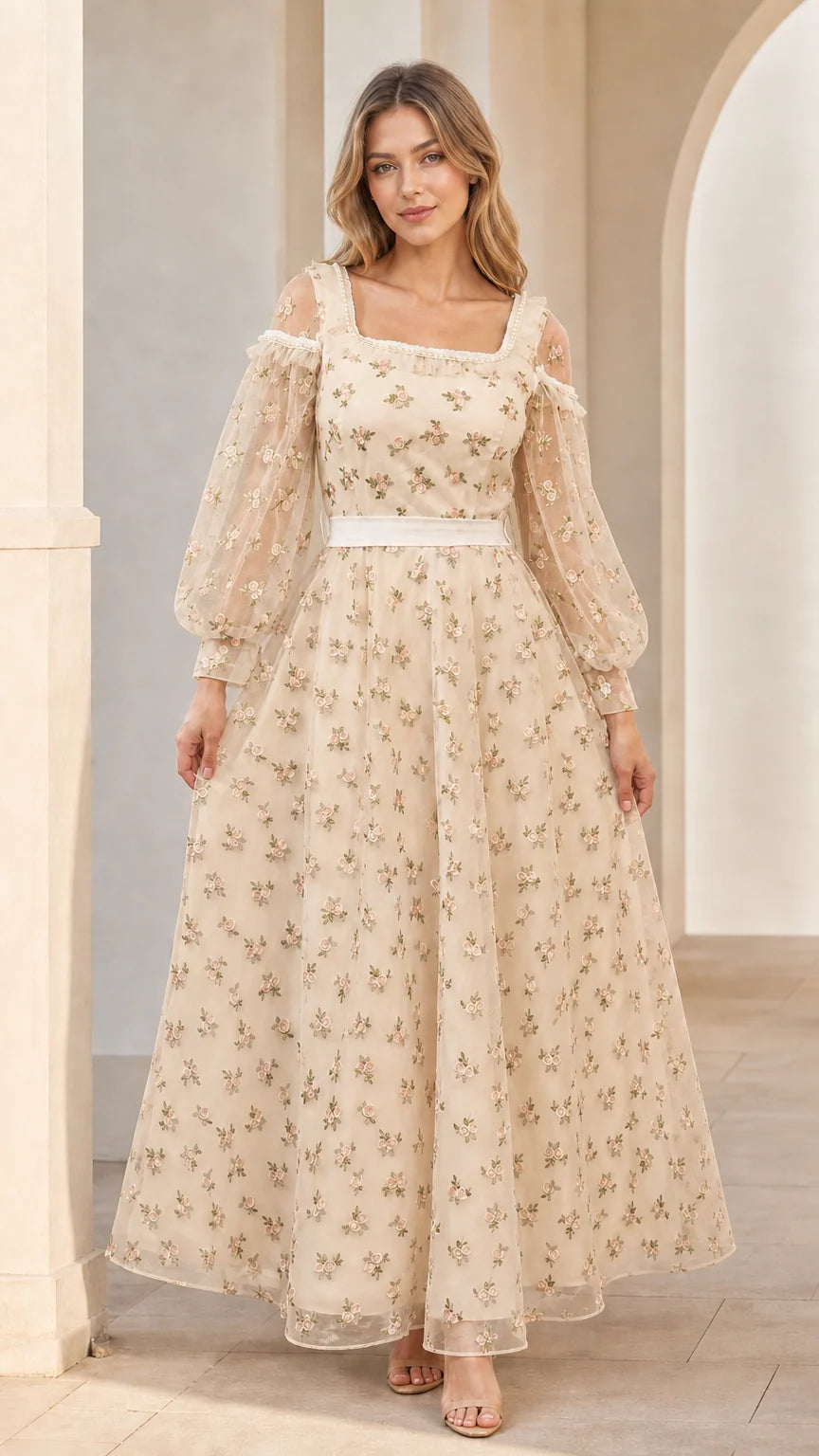 Model wearing champagne beige floral embroidered maxi dress